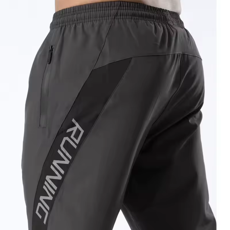 Pantalon de sport pour homme avec poches zippées, jogging d'entraînement, musculation, football, fit