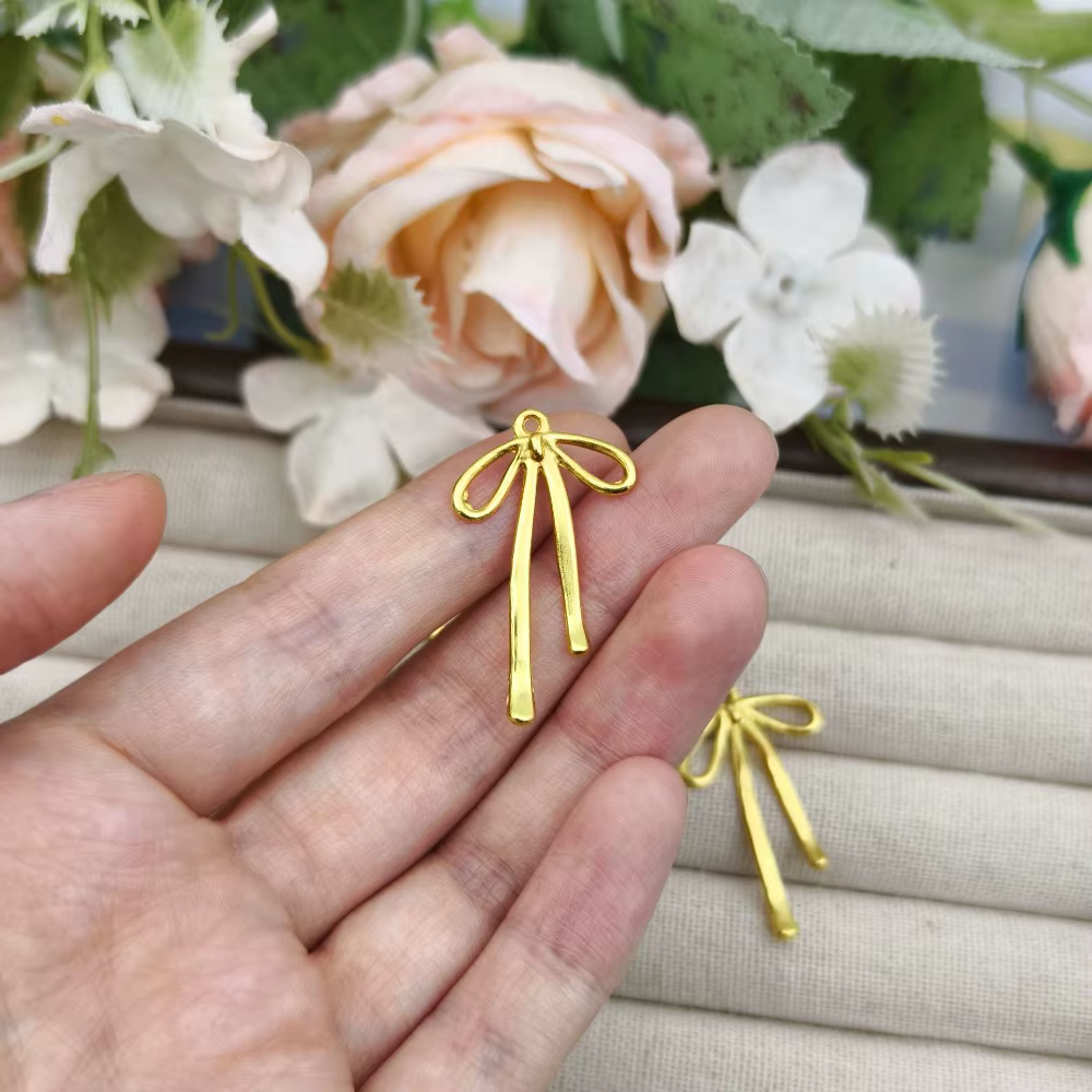 Accessoires mignons en métal doré en forme de nœud, matériaux de bricolage en gros, accessoires DIY, porte-clés, peuvent être librement assortis, décoration, cadeau