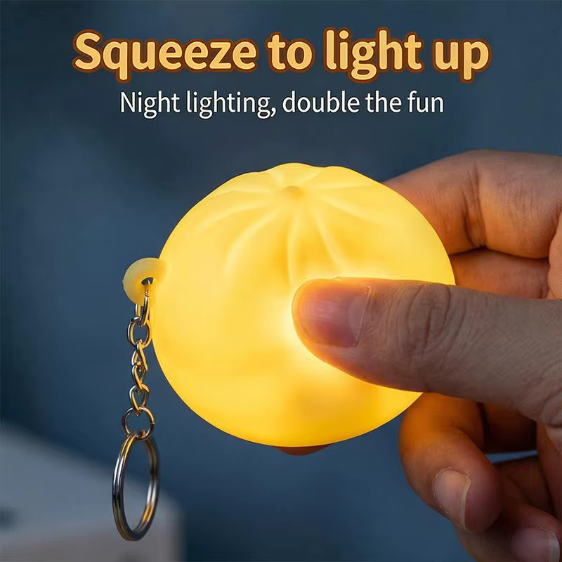 Porte-clés en silicone lumineux et adorable en forme de chignon, accessoire de dessin animé parfait pour le soulagement