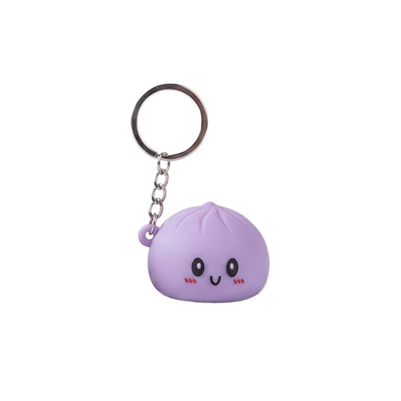 Porte-clés en silicone lumineux et adorable en forme de chignon, accessoire de dessin animé parfait pour le soulagement