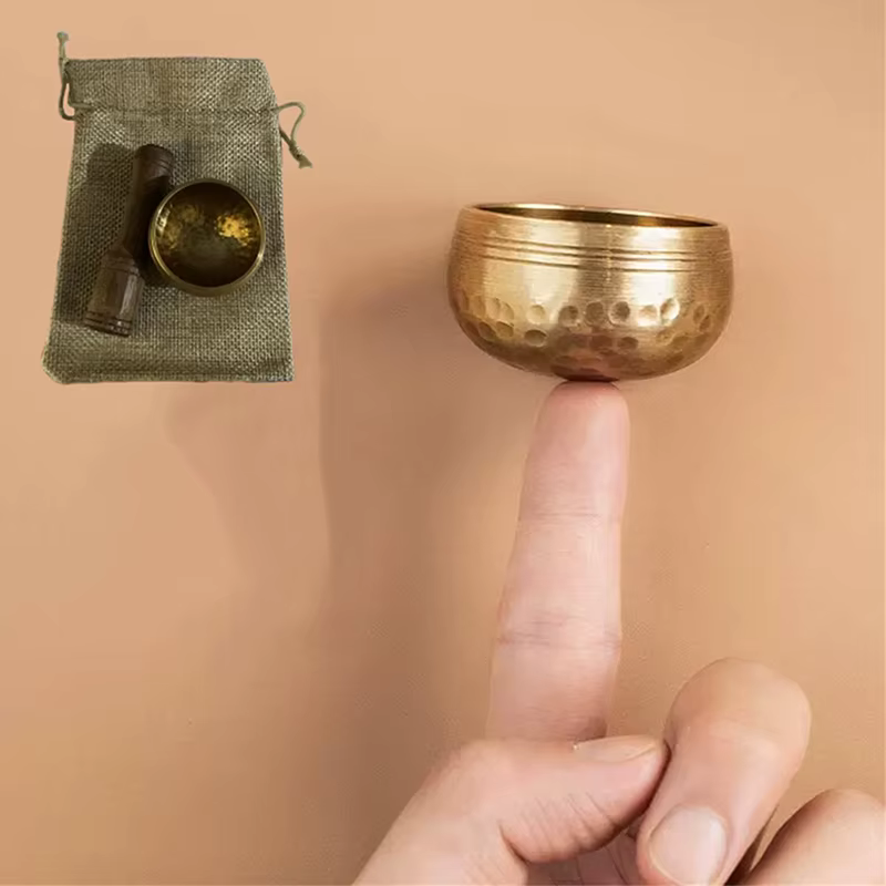 Mini bol chantant tibétain en laiton fait à la main